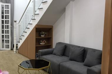 Bán nhà 1 trệt 2 lầu giá 1,65 tỷ HXH sát Gò Vấp, sổ hồng