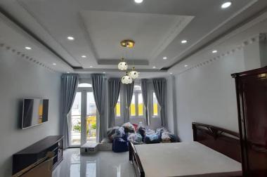 Nhà mặt tiền Phan Đăng Lưu  Phú Nhuận, 60m2(5x12), 5 tầng tuyệt đẹp,có thang máy giá 15 tỷ.