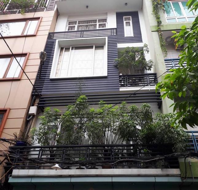 Bán nhà có thang máy,Trần Quốc Hoàn, Cầu Giấy 50M, 6T, MT 5,4M, giá 8.5tỷ, ô tô vào nhà.