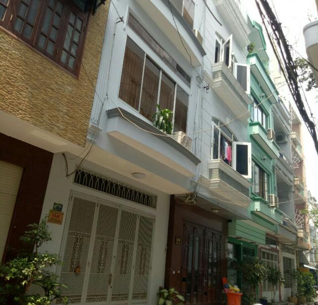 Cần tiền bán căn nhà mới xây đường Chữ Đồng Tử, Dt : 4x13m, nhà 4 tầng, giá 6.5 tỷ