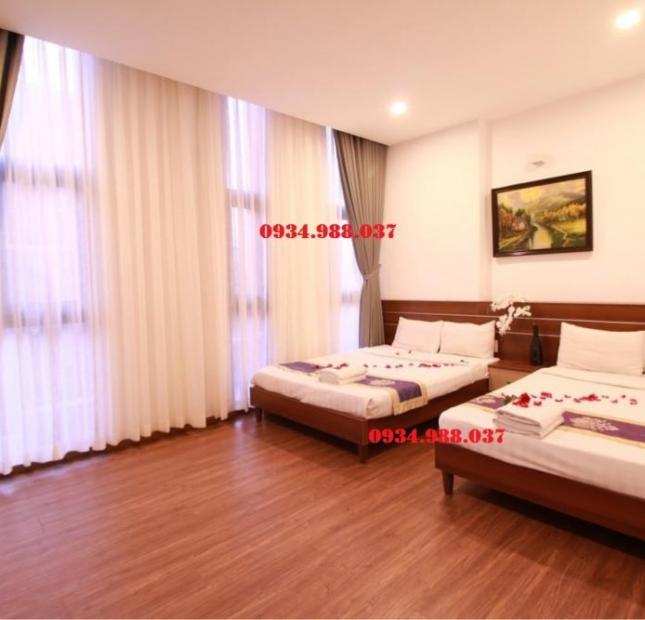 Bán khách sạn mặt tiền đường Bùi Văn Ba, DT 6.8x25m, nở hậu, 20 phòng đang cho thuê 70tr/th