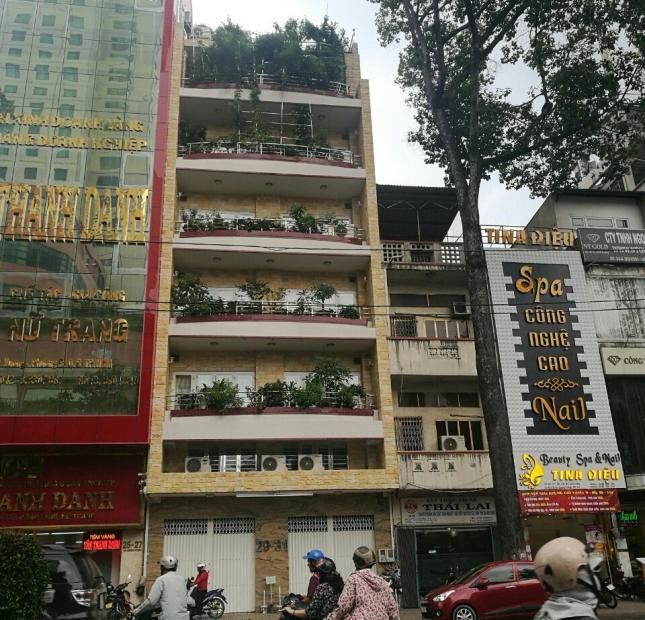 Bán nhà Q1, mặt tiền Trần Hưng Đạo 15m x 24m, xây 7 lầu, thang máy, giá 145 tỷ