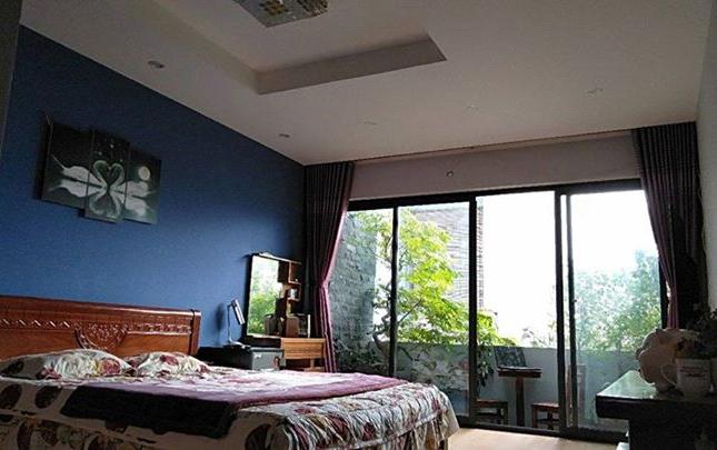 Bán nhà ngõ 525  Kim Mã oto vào nhà,gara,DT65m2,MT6m,Giá 11 tỷ,nhà mát mẻ,ở luôn.
