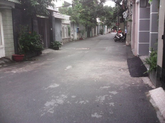 Bán nhà MT Sơn Cang-Châu Vĩnh Tế, P12. 5,2x18, trệt 1 lầu kiên cố.