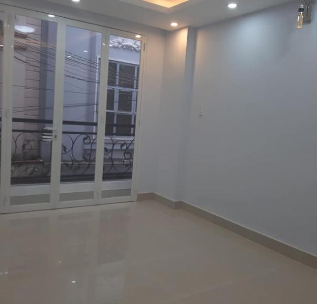 Xe hơi đậu cửa nhà mới dt 40m2, 3 lầu 3pn Đào Duy Anh, Phú Nhuận.