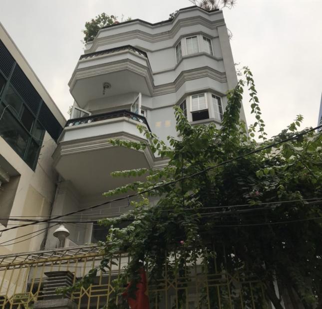 Bán nhà hầm 7 lầu thang máy 18 căn hộ DV Nguyễn Văn Giai, Q.1