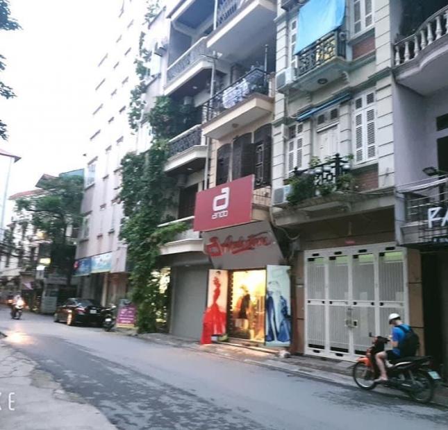 Kinh doanh khủng. Nhà mặt phố Nguyễn Phúc Lai, lô góc, ô tô đỗ cửa, DT 52 m2. Giá 9 tỷ 6