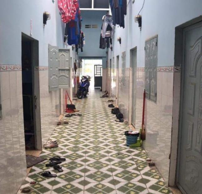 Cần tiền gấp bán đất mặt tiền chợ 300m2(10x30m) + 30 phòng trọ giá chỉ 900tr