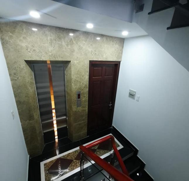 Nhà mặt tiền Phan Đăng Lưu  Phú Nhuận, 60m2(5x12), 5 tầng tuyệt đẹp,có thang máy giá 15 tỷ.