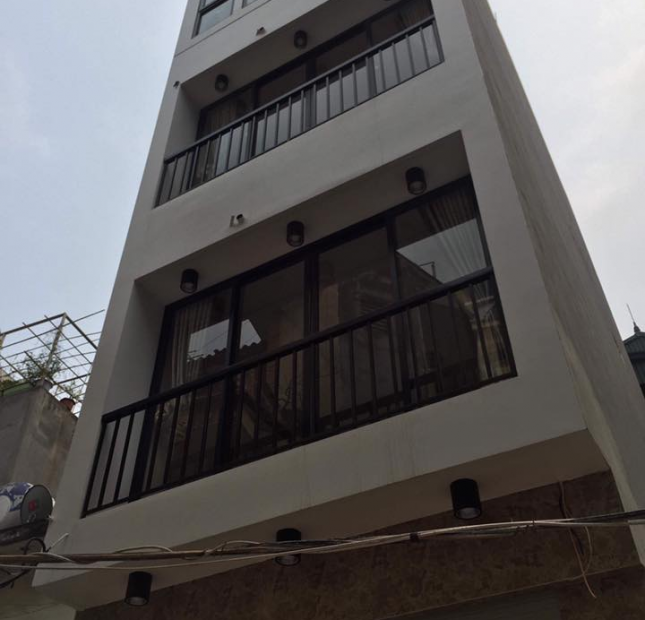 Bán tòa nhà 4 lầu mặt tiền đường Trần Hưng Đạo, Quận 5, DT: 7 x 18m, thuê 150tr/th