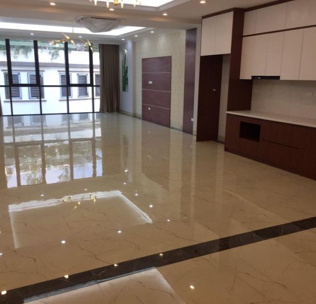 Bán building văn phòng Mạc Thái Tông 100m2 8 tầng mặt tiền 7.5m giá rao bán 35 tỷ