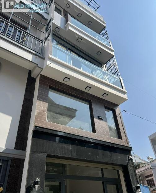 Bán căn nhà đẹp 5 tầng, HXH 8m ngay Vincom cách MT Nguyễn xí chỉ 20m, 4.3x15m