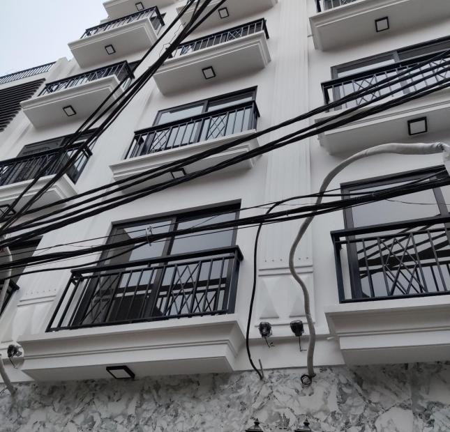 Bán nhà mặt ngõ 381 phố Nguyễn Khang dt 40 m2 x 6 thang máy giá 7.9 tỷ