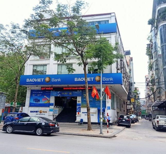 BÁN NHÀ MP NGUYỄN VĂN HUYÊN dt 136m2 MT 9m Vỉa hè KD Ô tô 4 làn giá 30 tỷ LH 0985780461