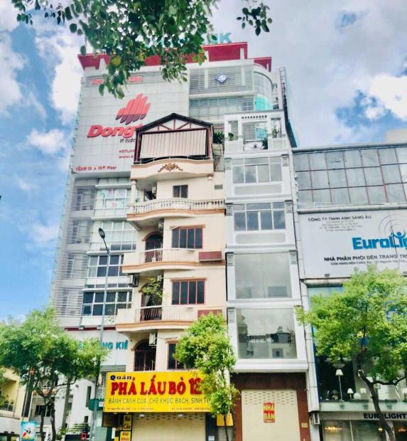 Cần bán căn nhà phố 1 hầm 6 lầu, mặt tiền đường Nguyễn Hữu Cầu, quận 1