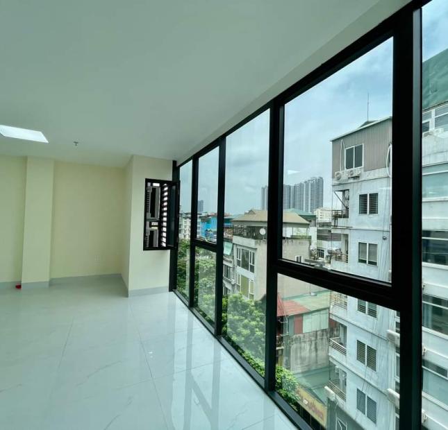 Bán gấp nhà aphố Trạm, Gara, view vườn hoa 100m2, 6 tầng, thang máy. MT7m 12 tỷ