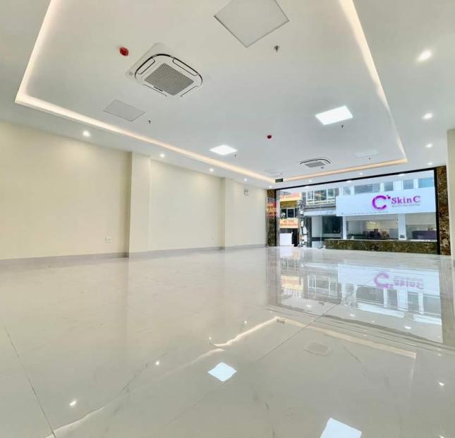 Bán gấp nhà aphố Trạm, Gara, view vườn hoa 100m2, 6 tầng, thang máy. MT7m 12 tỷ