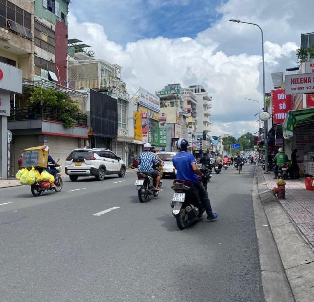 Bán nhà mặt tiền ngay chợ trung tâm Q.Phú Nhuận.DT 61m2,5 tầng 7 PN.Giá chỉ 12,5 tỷ.