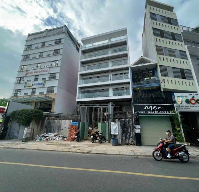Cho thuê tòa nhà MT Quang Trung, P.8, GV ,10x35 ,Hầm 6L ,110tr/t 
