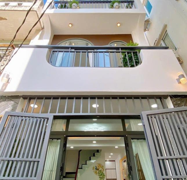Bán nhà mới đẹp Nơ Trang Long, Bình Thạnh. Xe hơi 7 chỗ đậu cửa, gần chợ Bà Chiểu giá 6,7 tỷ.